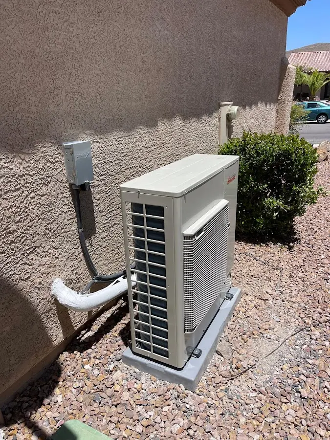 Residential air conditioning condenser unit in Clay
